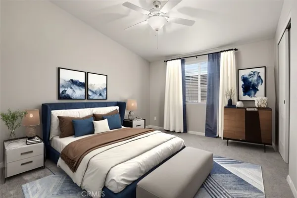 an empty room with a chandelier fan and windows