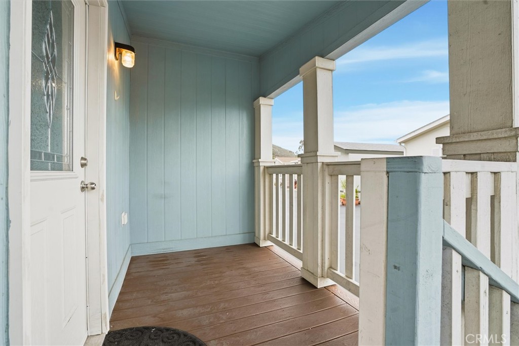 500 Atascadero Road Morro Bay, CA 93442 - Photo 6 of 43 a view of a hallway with wooden floor and staircase