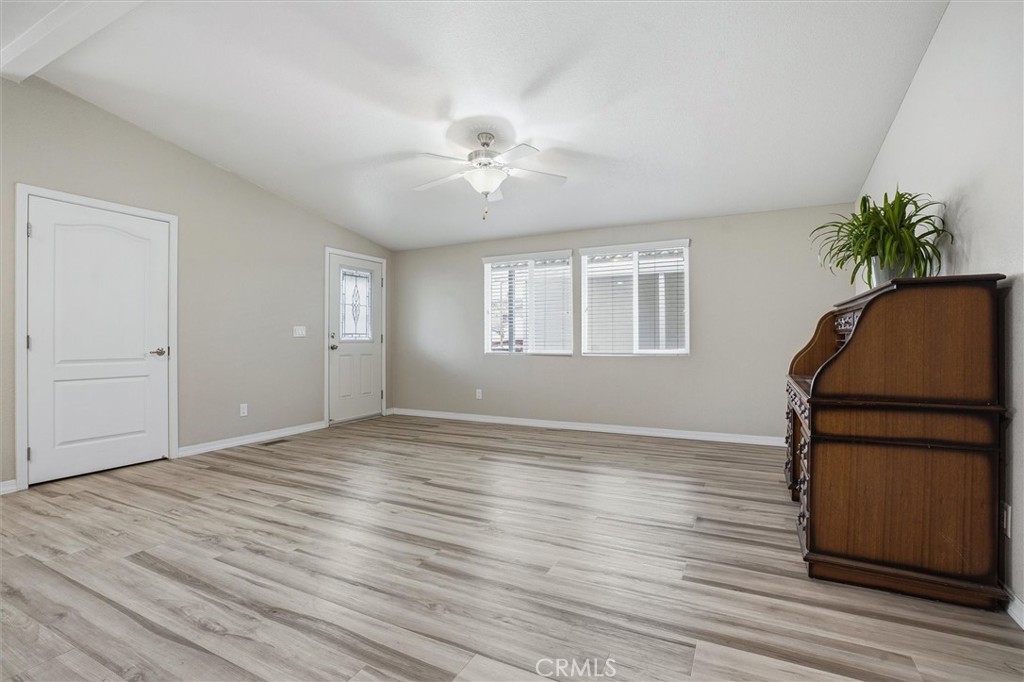 500 Atascadero Road Morro Bay, CA 93442 - Photo 10 of 43 an empty room with wooden floor and window