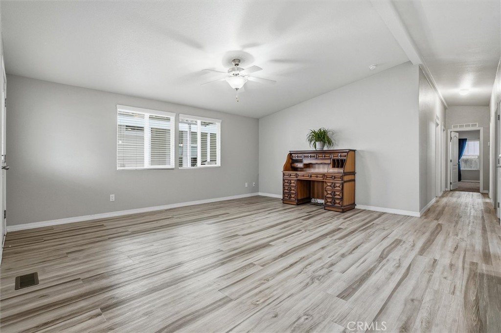 500 Atascadero Road Morro Bay, CA 93442 - Photo 10 of 43 wooden floor in an empty room with a window