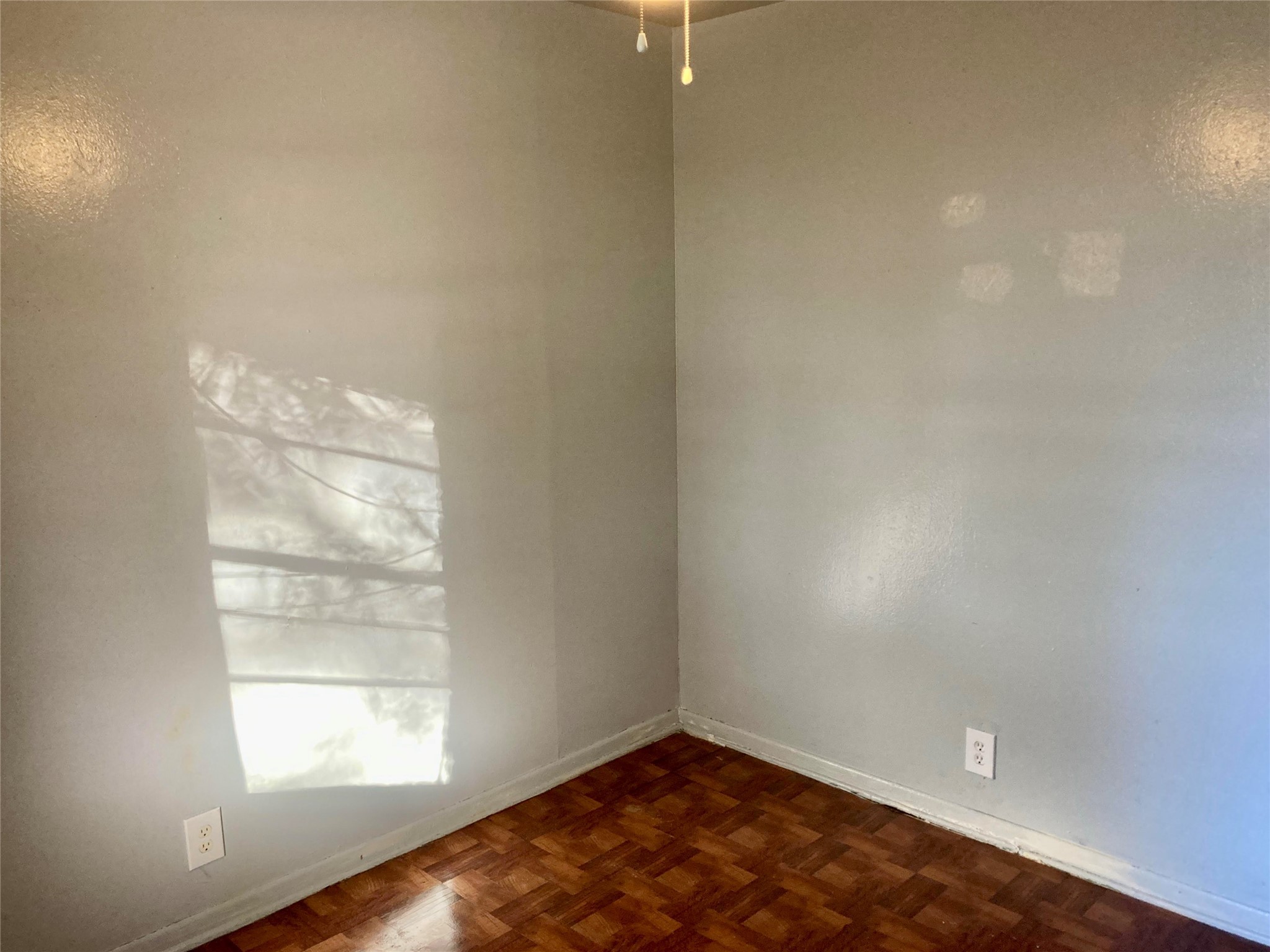 143 Moffett Springs Road, Unit A Huntsville, TX 77320 - Photo 11 of 16 an empty room with windows