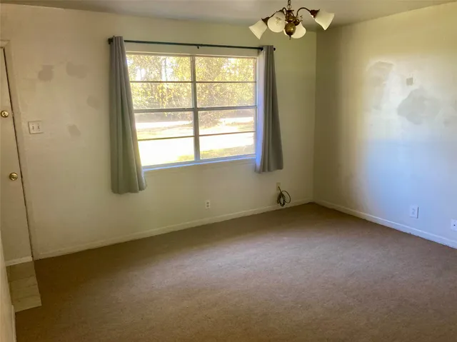 an empty room with a window