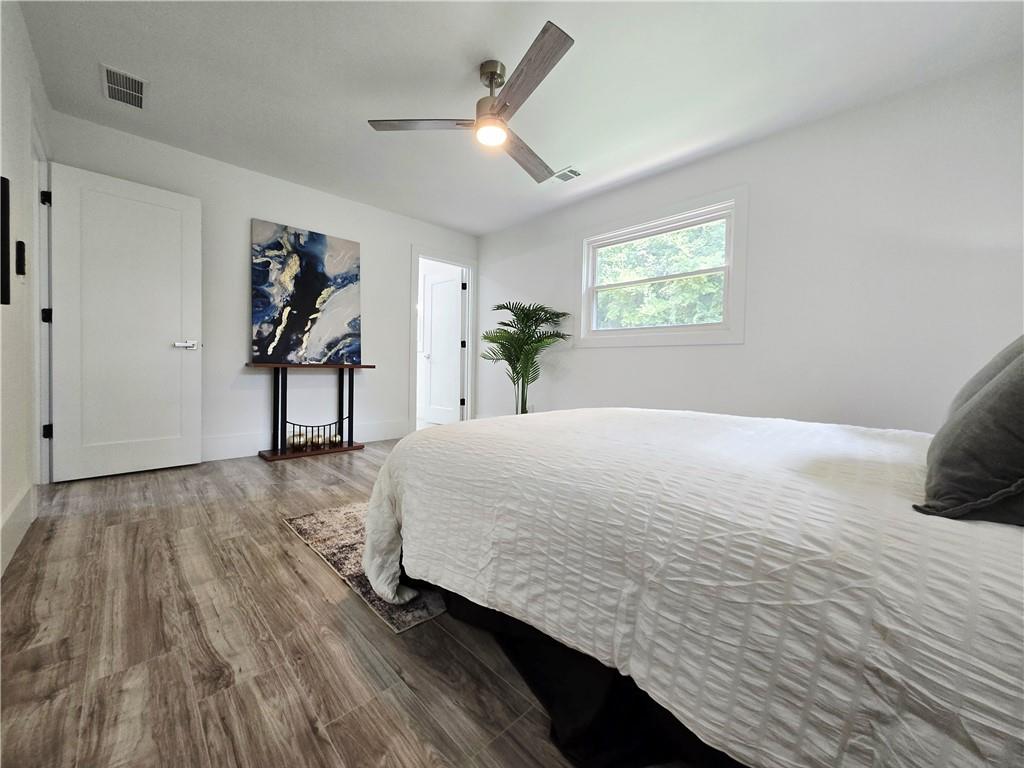 2400 Glenrock Drive Decatur, GA 30032 - Photo 17 of 39 a bedroom with a bed and a window