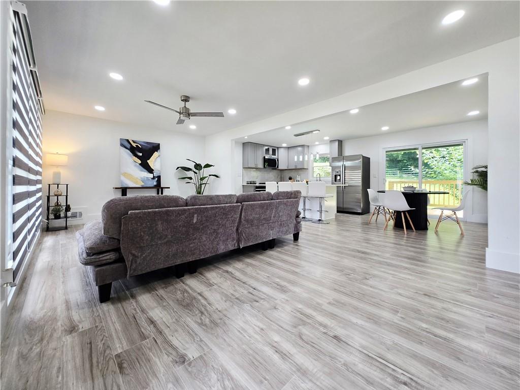 2400 Glenrock Drive Decatur, GA 30032 - Photo 4 of 39 a living room with furniture and wooden floor