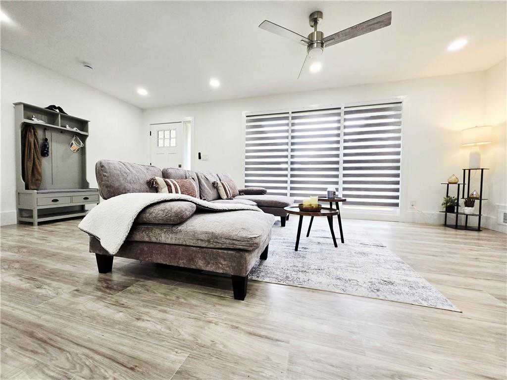 2400 Glenrock Drive Decatur, GA 30032 - Photo 7 of 39 a living room with a bed furniture and a window
