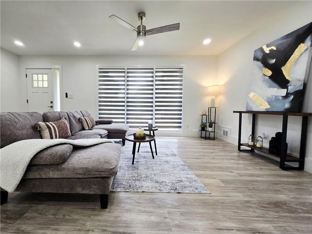 2400 Glenrock Drive Decatur, GA 30032 - Photo 8 of 39 a living room with furniture and wooden floor