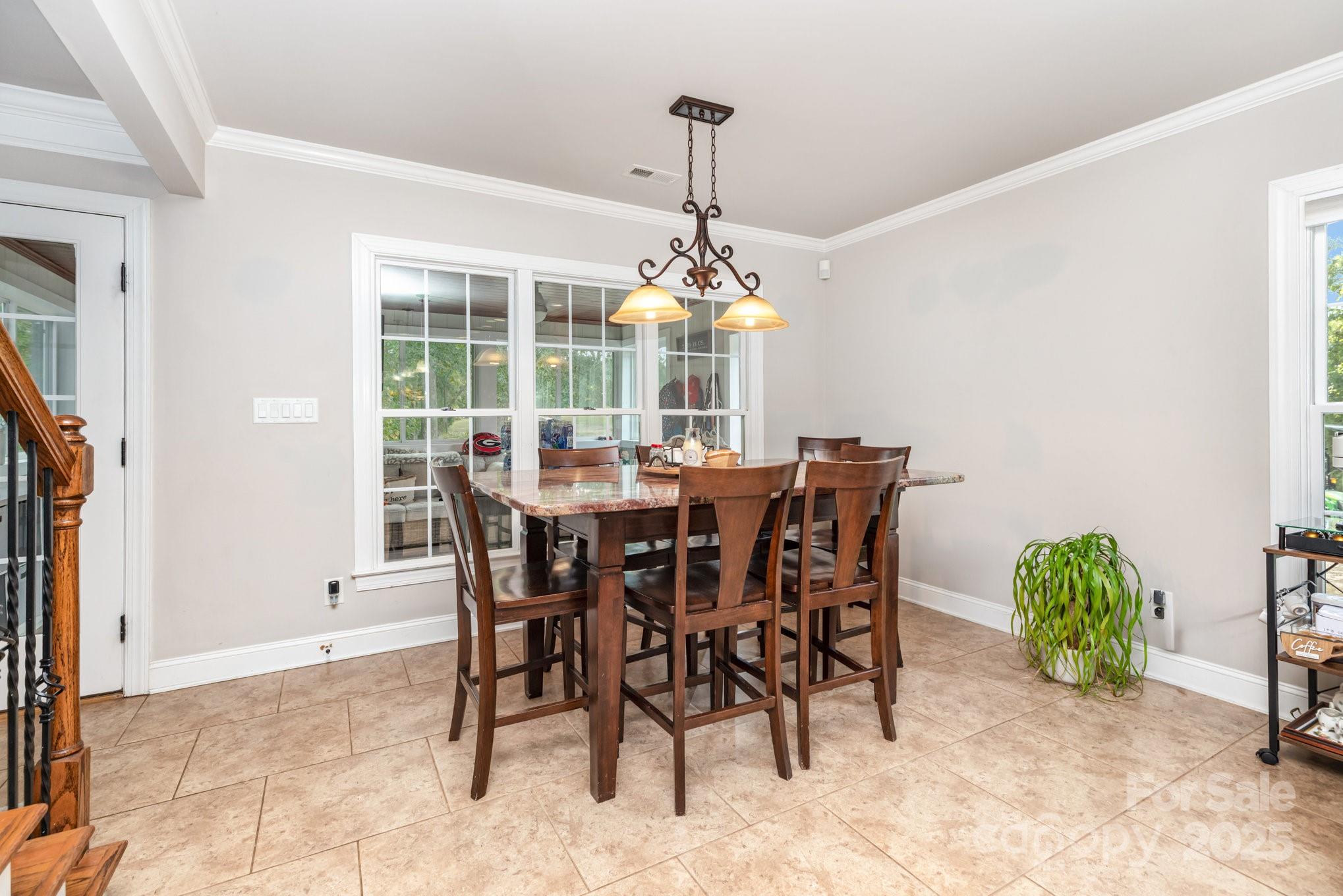 3351 Beulah Church Road Matthews, NC 28104 - Photo 5 of 33 a view of a dining room with furniture and window
