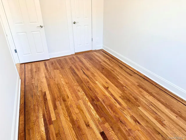 a view of backyard with wooden floor