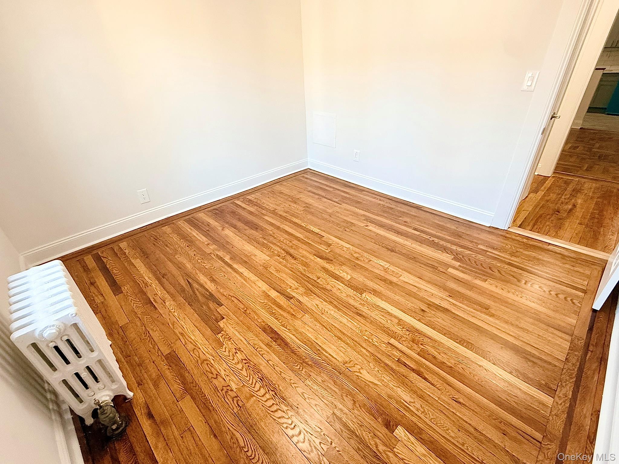 47-48 43rd Street, Unit 2F Queens, NY 11377 - Photo 22 of 29 a view of wooden floor
