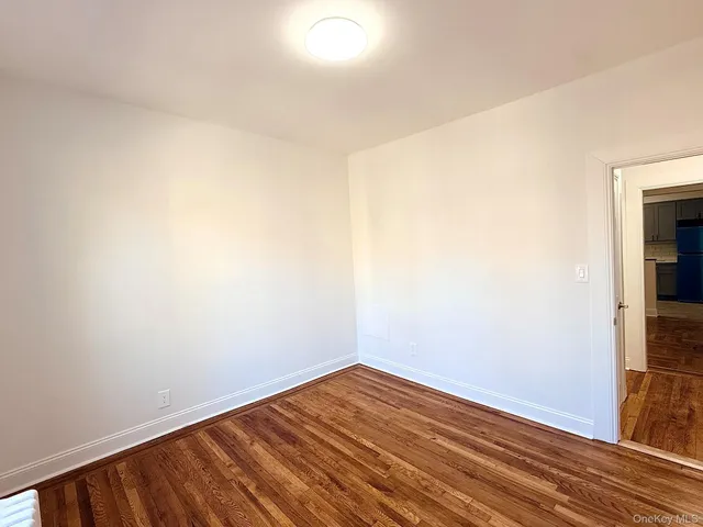a view of kitchen and wooden floor