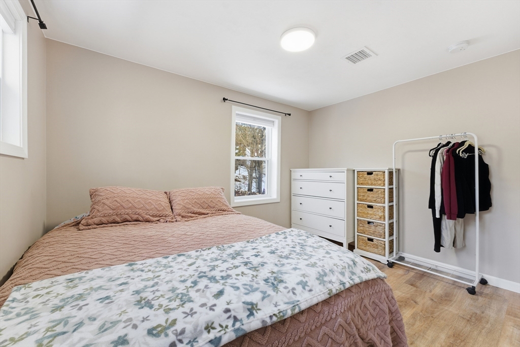 160 Cottage Street Athol, MA 01331 - Photo 18 of 35 a bedroom with a bed and walk in closet