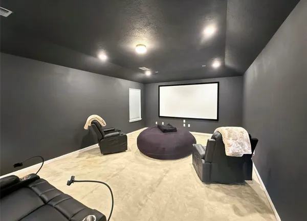 a room with furniture and air hockey table