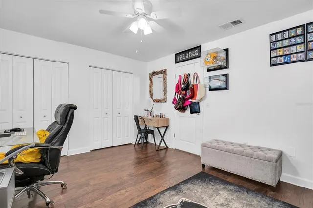 a view of a workspace with furniture and workspace