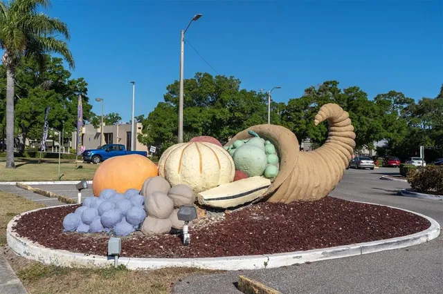 a view of a swimming pool in the backyard of a house