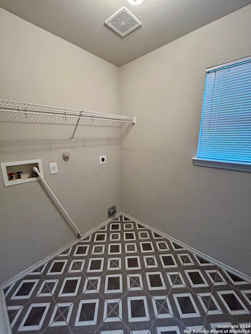 145 Pinto Place Cibolo, TX 78108 - Photo 17 of 32 a view of a black and white checkered floor