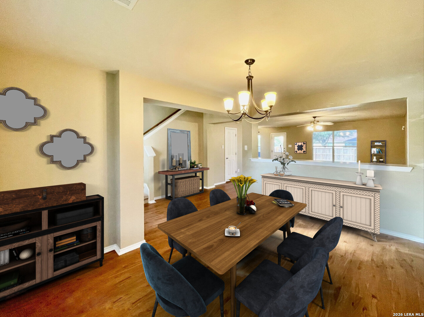 145 Pinto Place Cibolo, TX 78108 - Photo 2 of 32 a view of a dining room with furniture and a chandelier