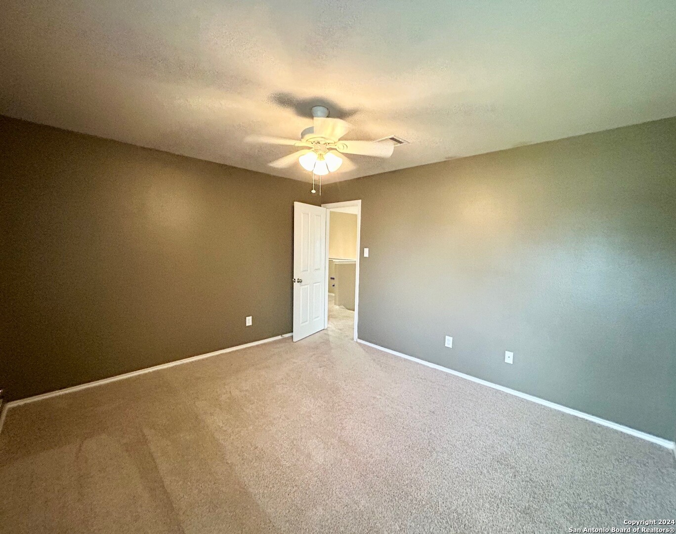145 Pinto Place Cibolo, TX 78108 - Photo 27 of 32 an empty room and a chandelier fan