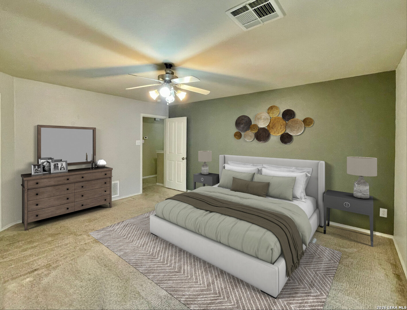 145 Pinto Place Cibolo, TX 78108 - Photo 3 of 32 a spacious bedroom with a bed a couch and a chandelier