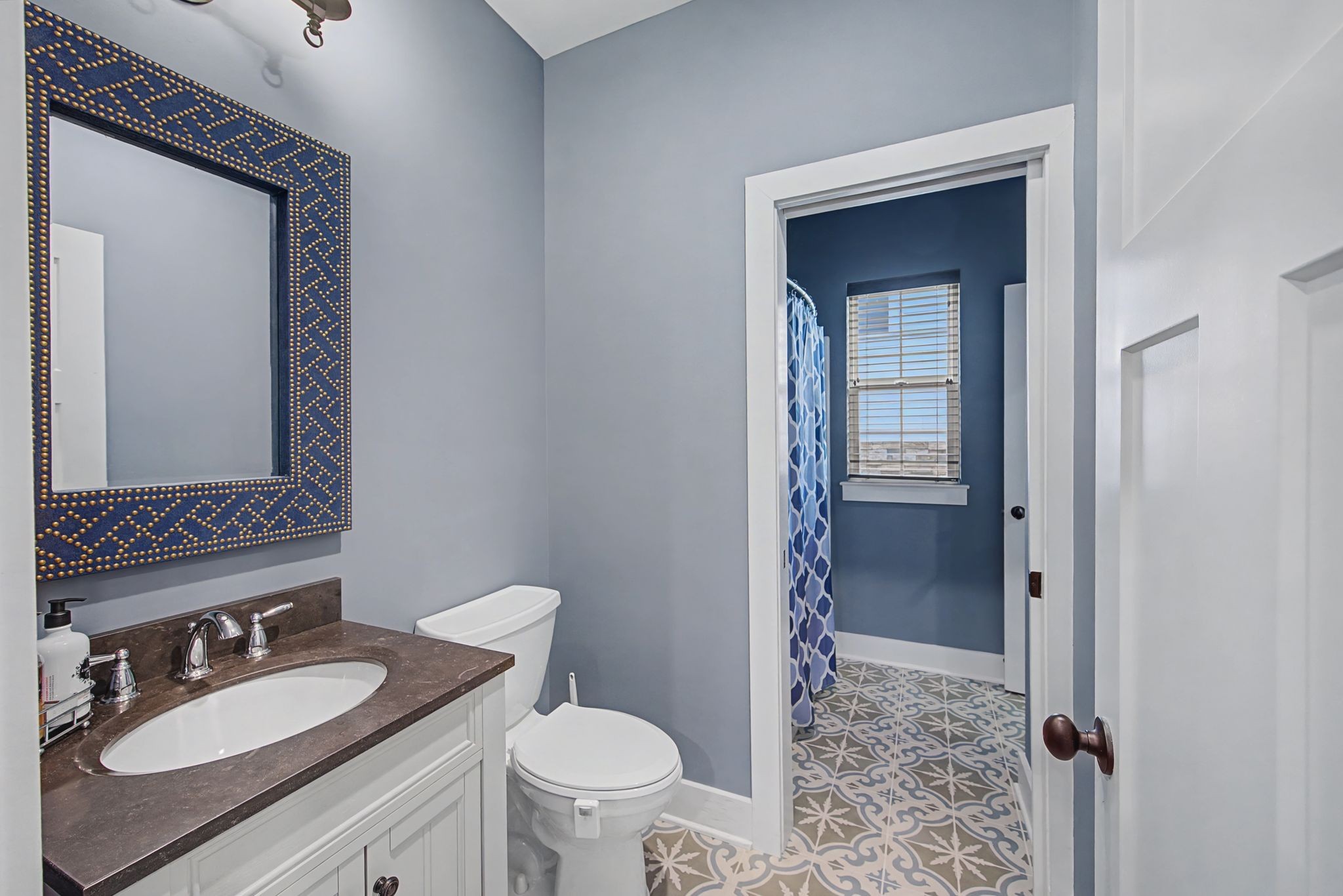 420 Anderson Lane Madison, TN 37115 - Photo 7 of 28 a bathroom with a granite countertop sink toilet and mirror