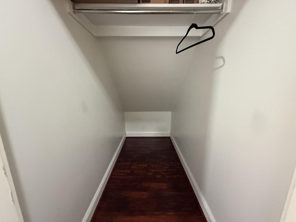 117 Hanover Street Grand Prairie, TX 75052 - Photo 37 of 40 a view of a hallway with wooden floor