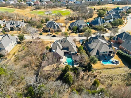 a view of residential houses with outdoor space