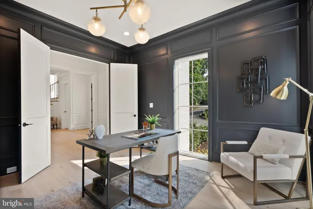 a view of a chandelier in a room with a chandelier