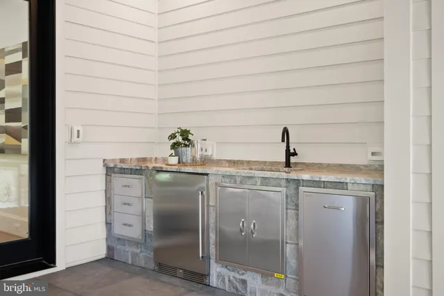 a view of bathroom with a bathtub and shower