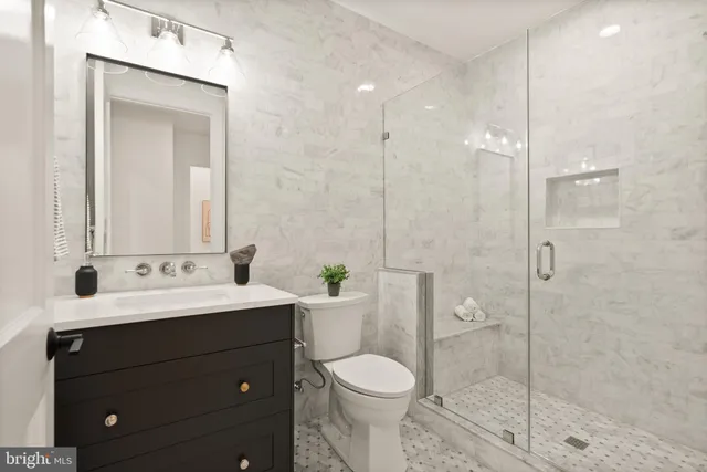 a bathroom with a sink and a shower