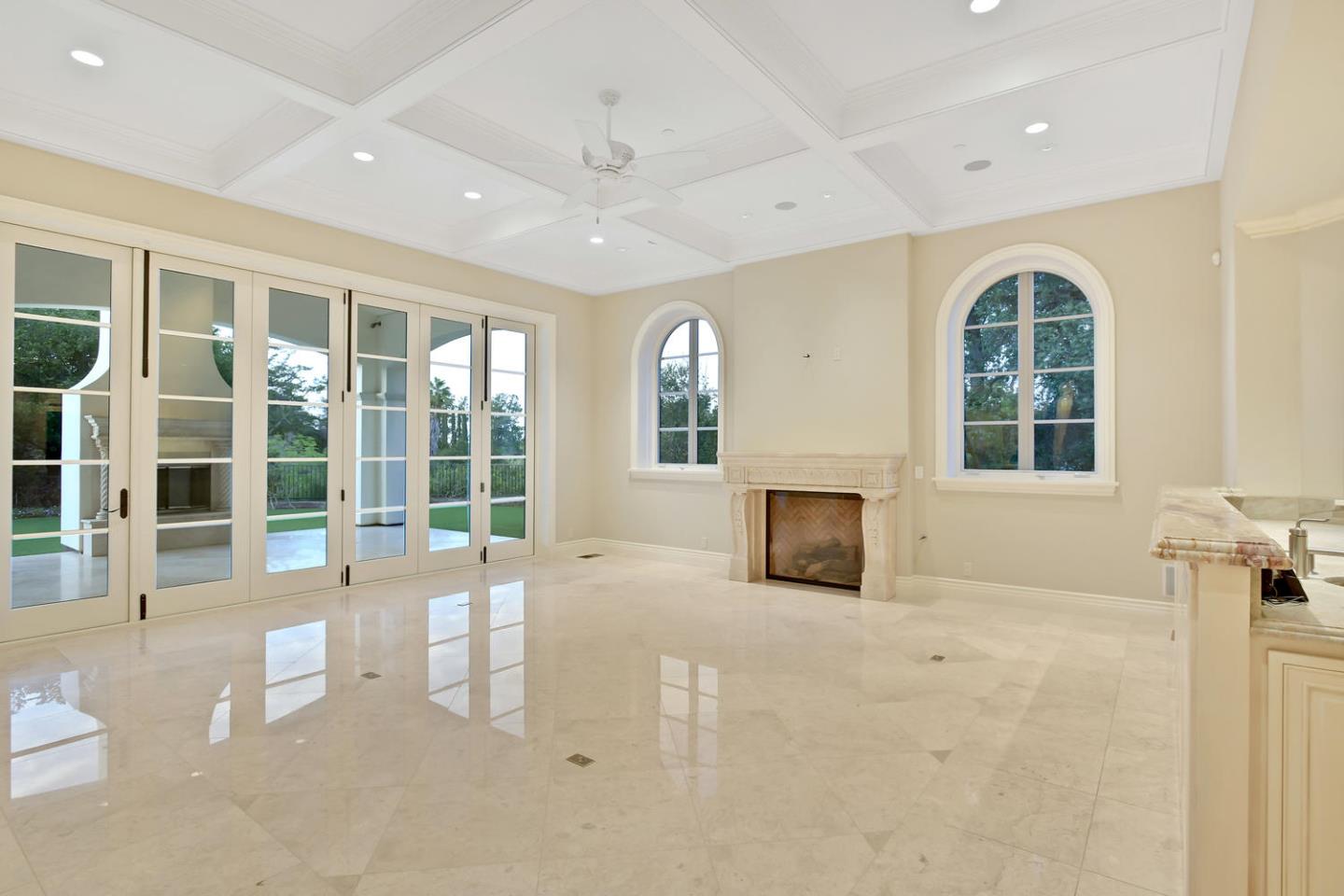 18612 Decatur Road Monte Sereno, CA 95030 - Photo 26 of 50 a view of an empty room with a window and fireplace