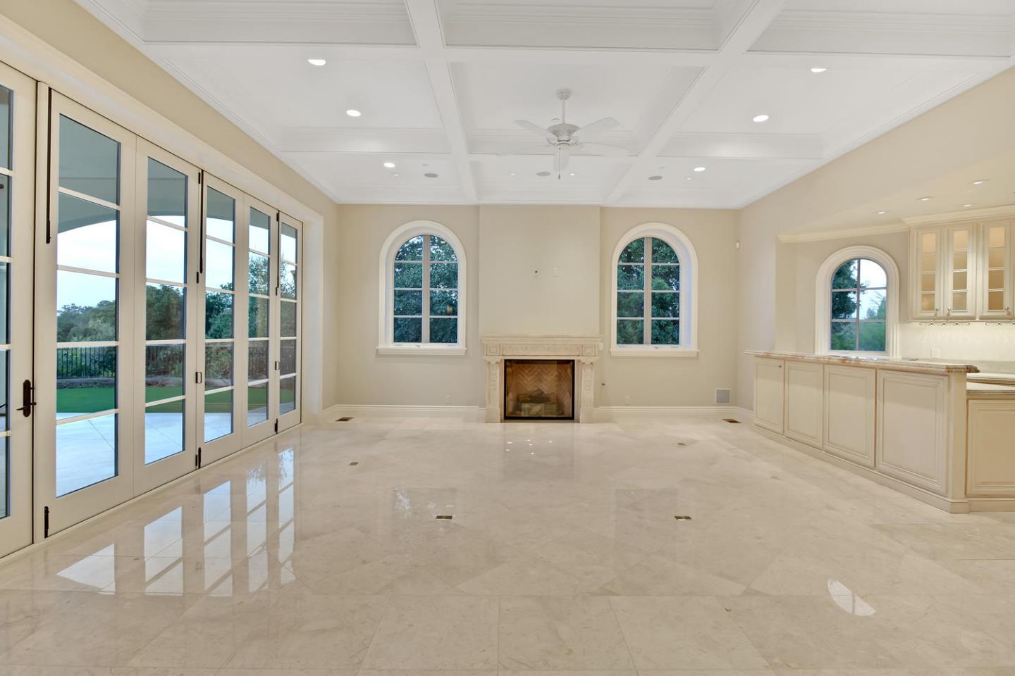 18612 Decatur Road Monte Sereno, CA 95030 - Photo 27 of 50 a view of an empty room with a fireplace and a window