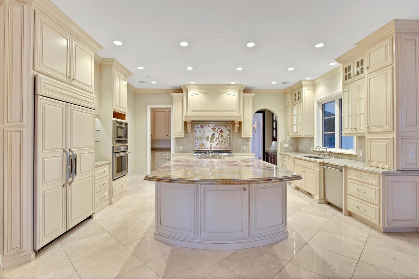 18612 Decatur Road Monte Sereno, CA 95030 - Photo 30 of 50 a kitchen with stainless steel appliances granite countertop a stove and a sink