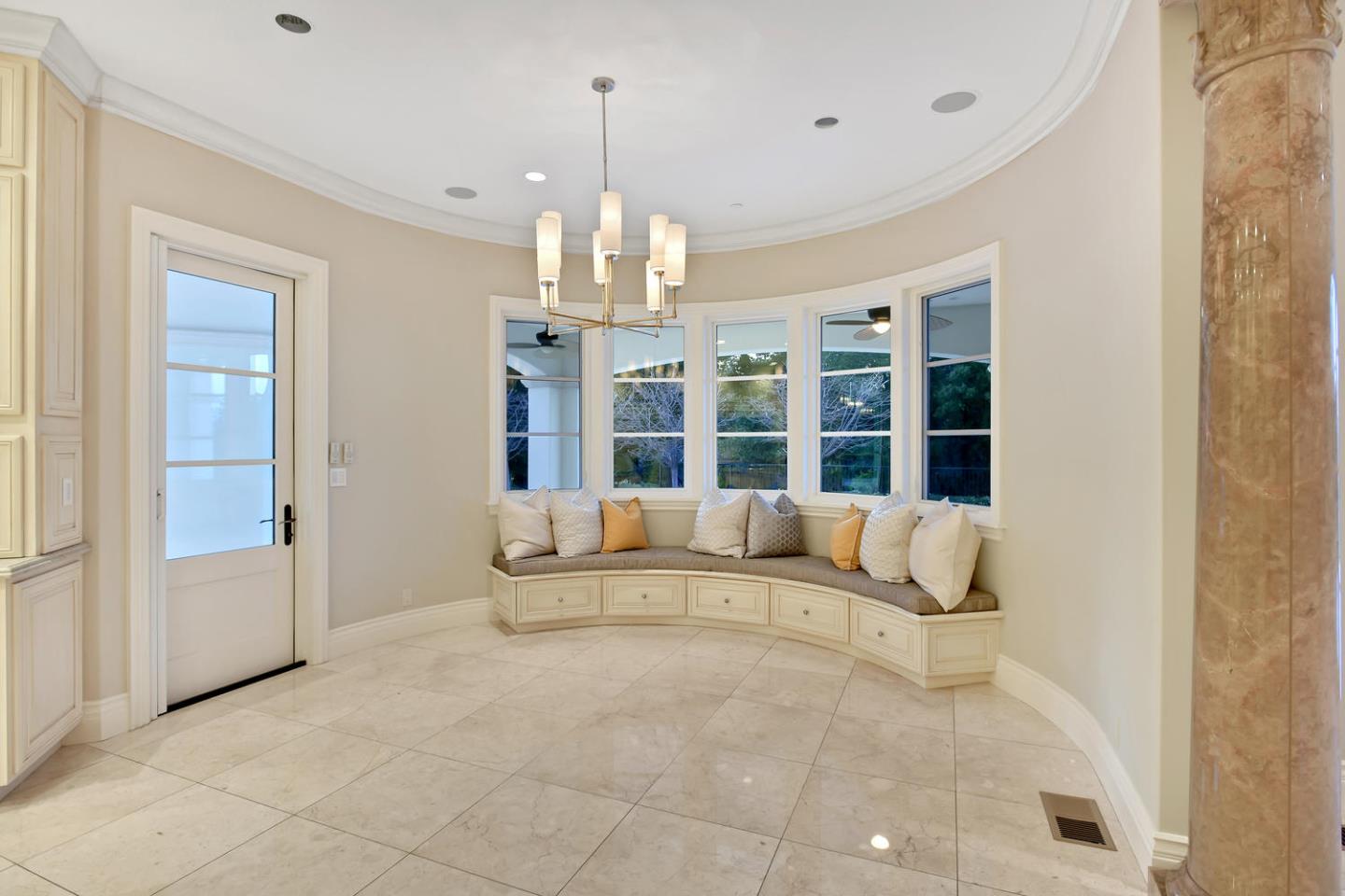 18612 Decatur Road Monte Sereno, CA 95030 - Photo 32 of 50 a living room with furniture and a chandelier