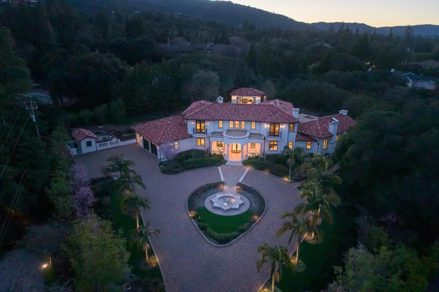 18612 Decatur Road Monte Sereno, CA 95030 - Photo 4 of 50 a view of a house with garden space and a swimming pool