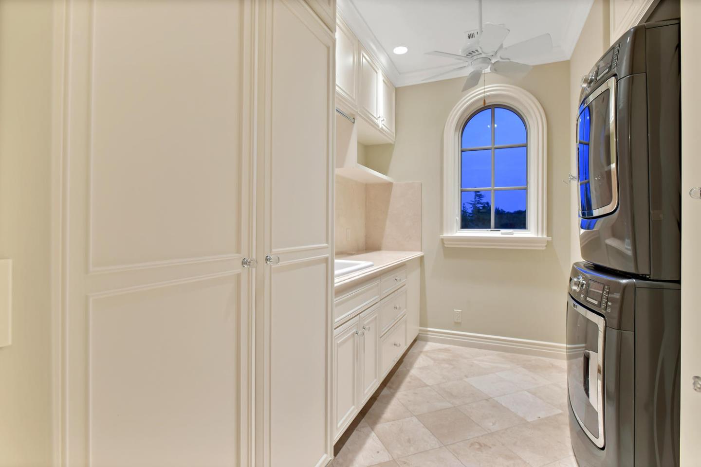 18612 Decatur Road Monte Sereno, CA 95030 - Photo 47 of 50 a kitchen with a refrigerator and cabinets