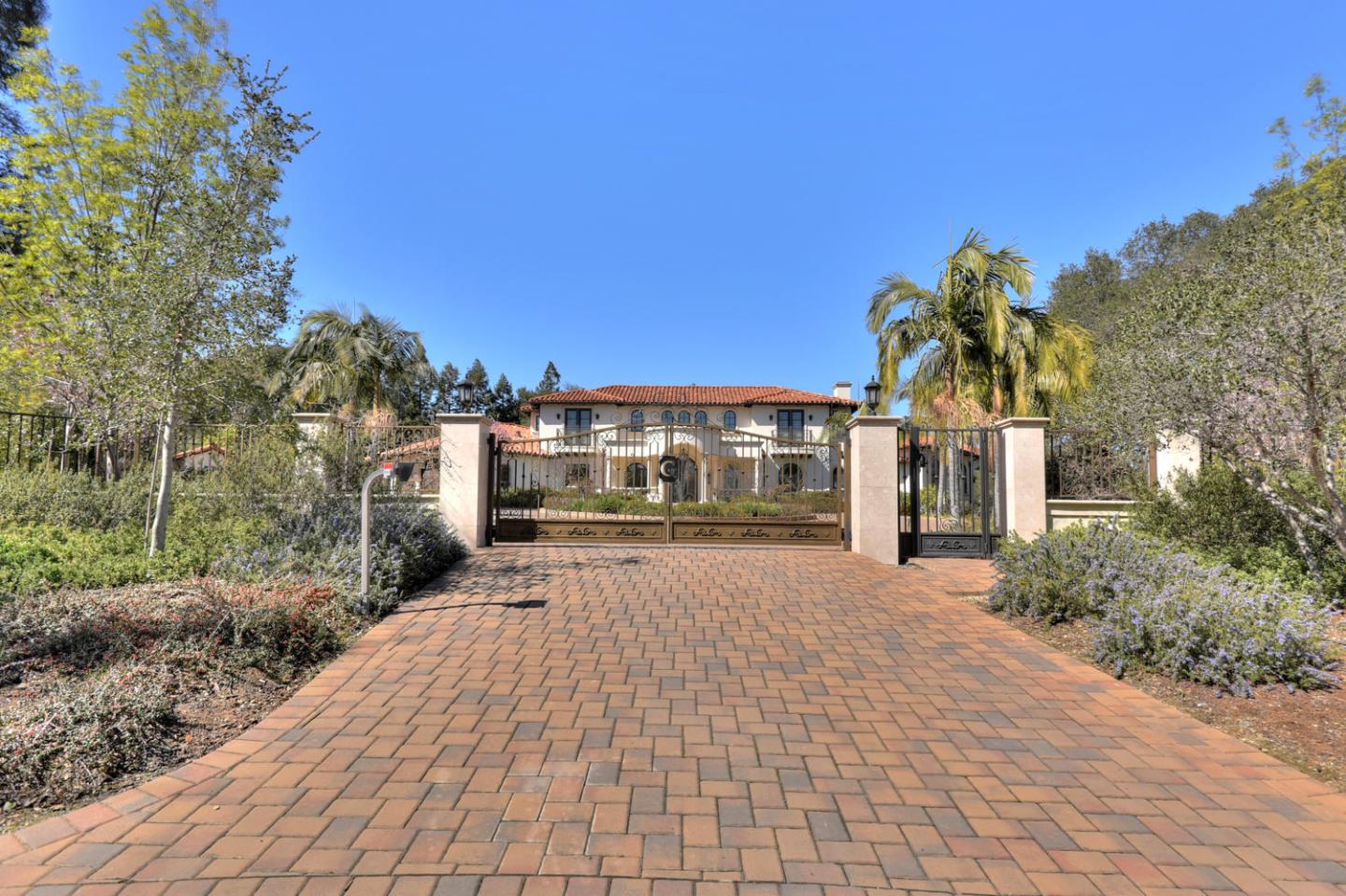 18612 Decatur Road Monte Sereno, CA 95030 - Photo 6 of 50 a front view of a house with a yard and trees