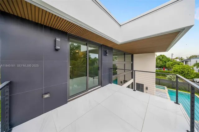 a view of swimming pool with a yard