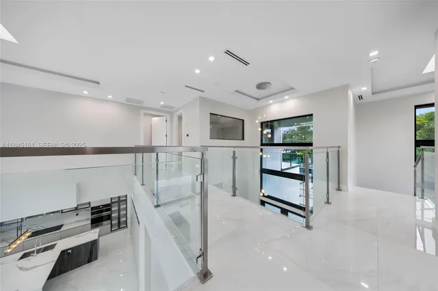 a bathroom with a tub and a toilet