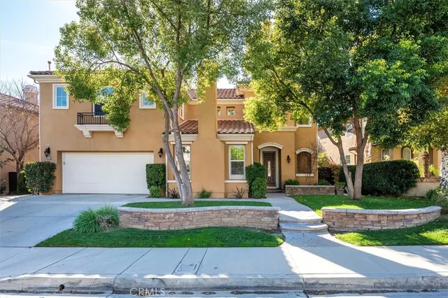 a front view of house with yard