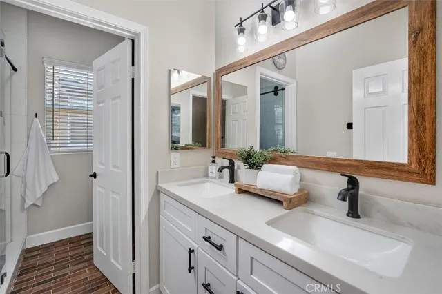 an aerial view of city and mountain