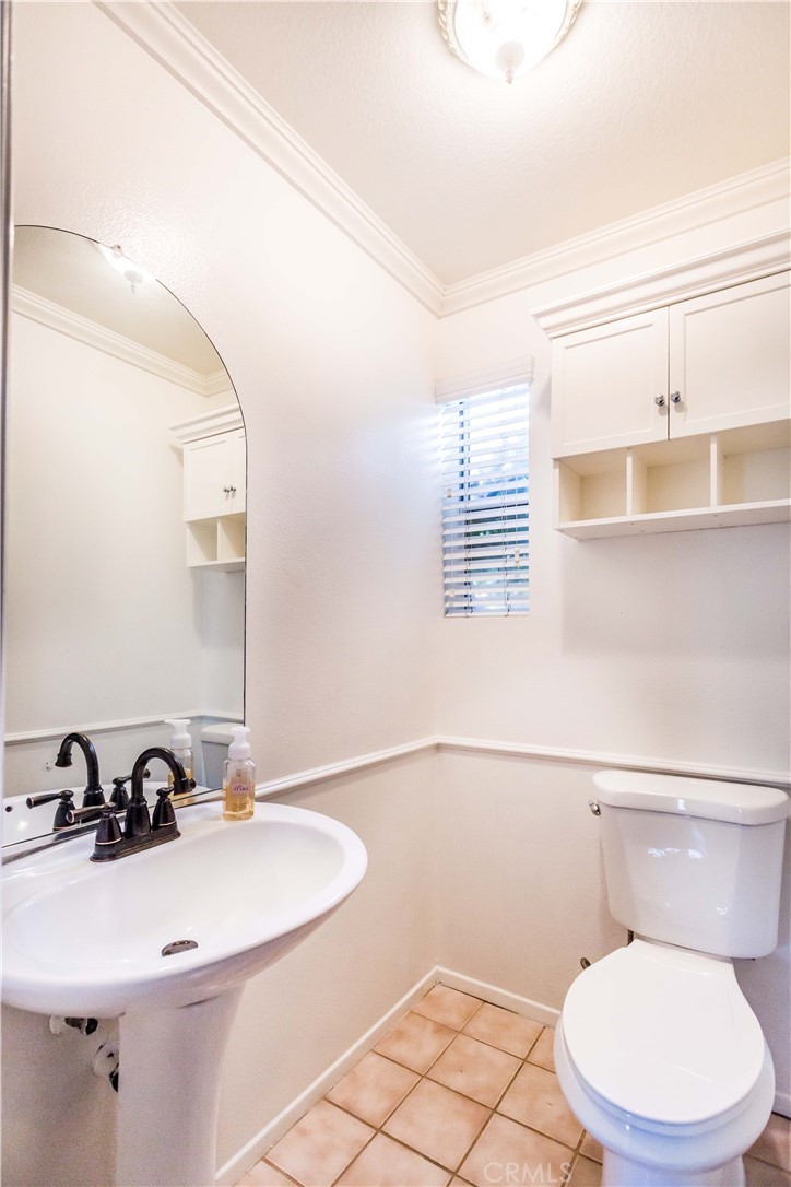 111 Colony Way Aliso Viejo, CA 92656 - Photo 14 of 29 a bathroom with a sink a toilet and mirror