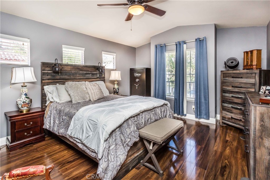 111 Colony Way Aliso Viejo, CA 92656 - Photo 16 of 29 a bedroom with a bed and wooden floor