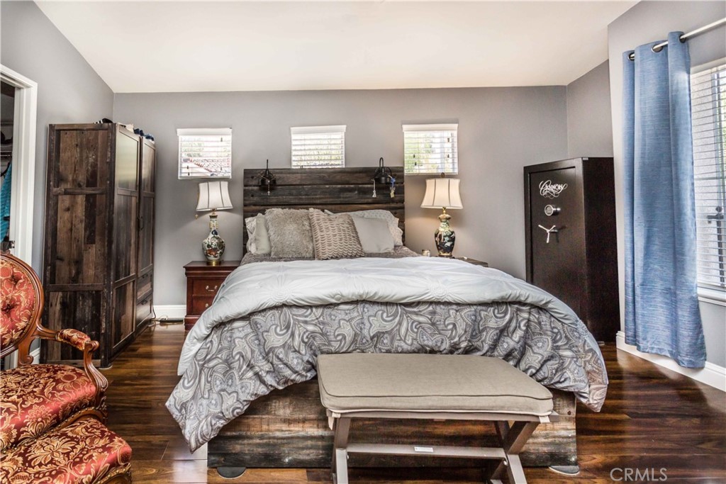 111 Colony Way Aliso Viejo, CA 92656 - Photo 17 of 29 a bed sitting in a bedroom and mirror