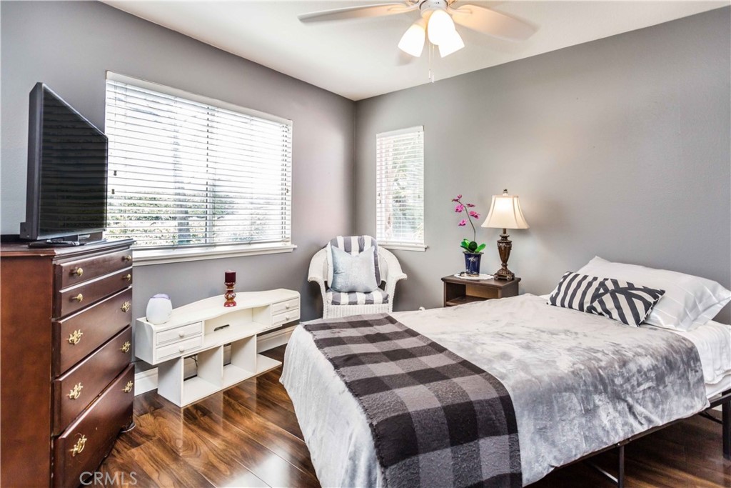 111 Colony Way Aliso Viejo, CA 92656 - Photo 23 of 29 a bedroom with a bed and a flat screen tv