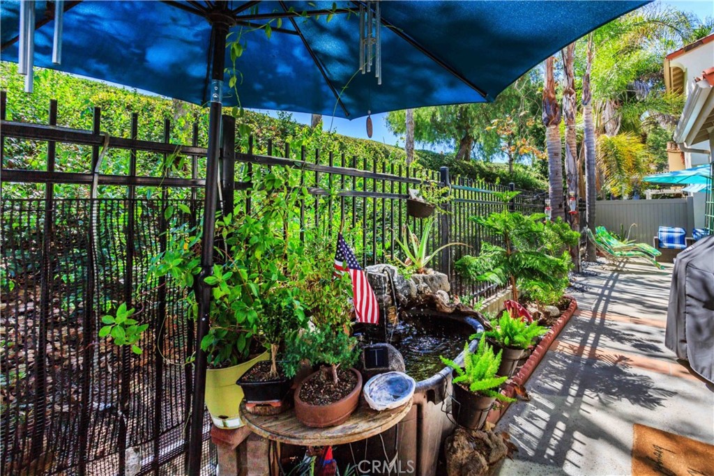 111 Colony Way Aliso Viejo, CA 92656 - Photo 27 of 29 a view of a backyard with plants and a patio