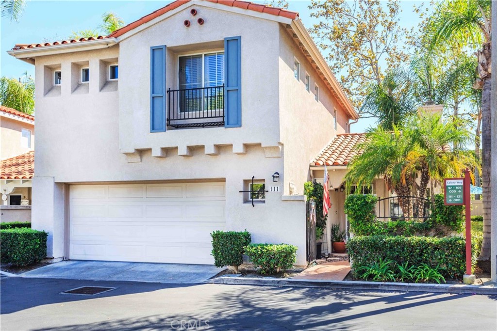 111 Colony Way Aliso Viejo, CA 92656 - Photo 29 of 29 a front view of a house with a yard and garage