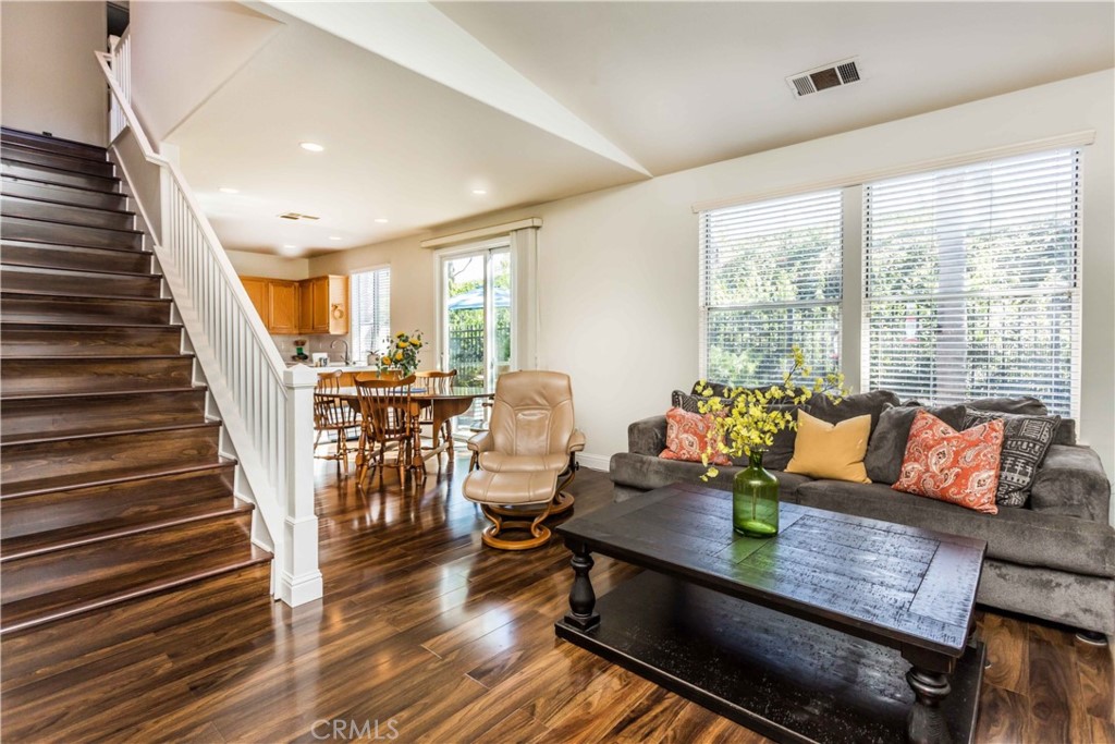 111 Colony Way Aliso Viejo, CA 92656 - Photo 4 of 29 a living room with furniture and wooden floor