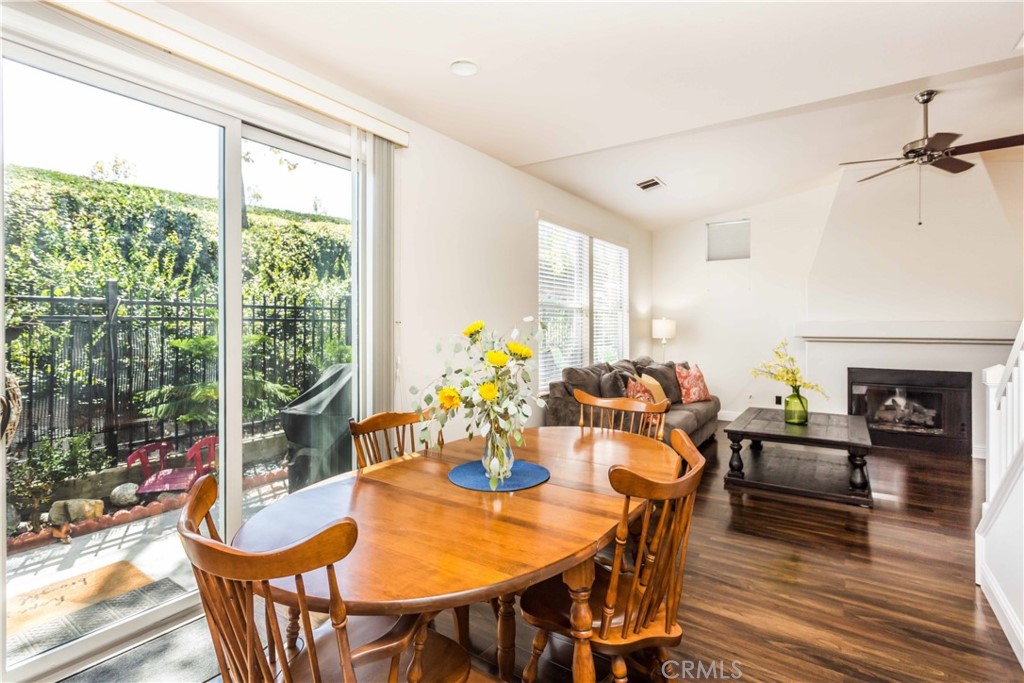 111 Colony Way Aliso Viejo, CA 92656 - Photo 7 of 29 a view of a dining room with furniture window and wooden floor
