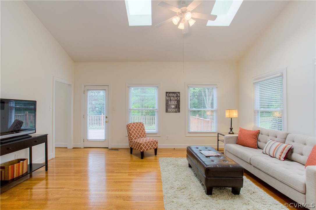 205 Arrowview Court Henrico, VA 23229 - Photo 16 of 38 Florida Room with vaulted ceiling and skylights