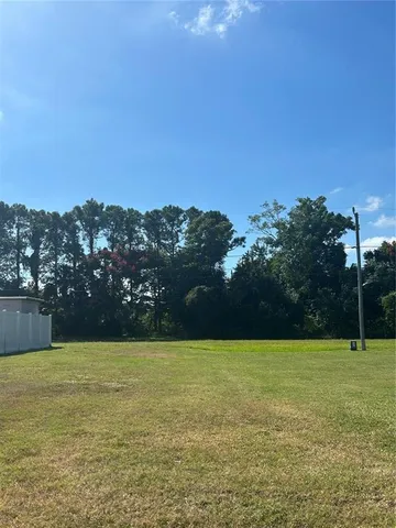 a view of a swimming pool and lake view