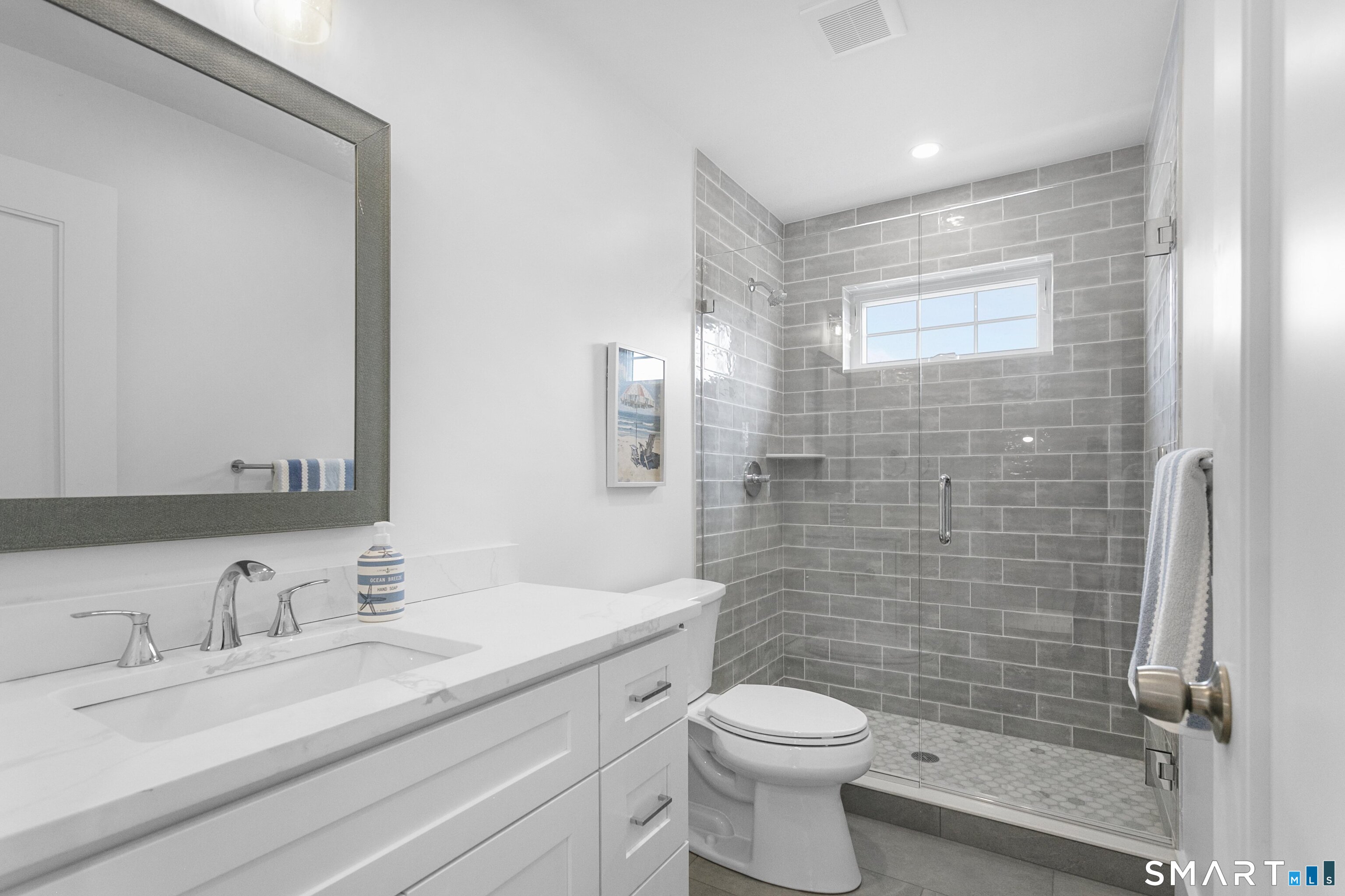 12 Sandy Way Fairfield, CT 06824 - Photo 23 of 33 a bathroom with a granite countertop sink toilet and shower
